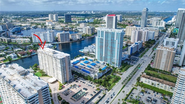 drone / aerial view with a water view