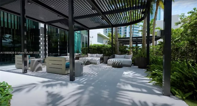 view of patio / terrace featuring a pergola and outdoor lounge area