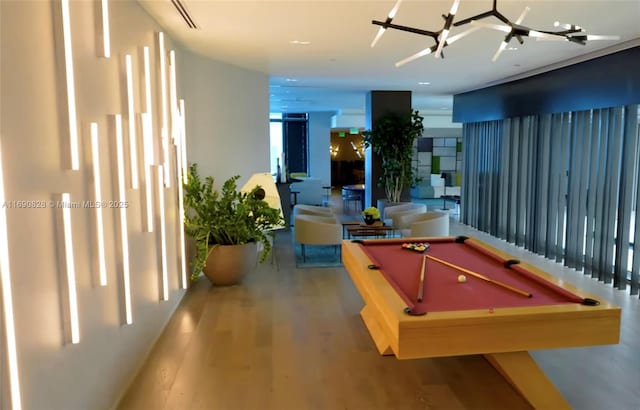 recreation room featuring hardwood / wood-style flooring and billiards