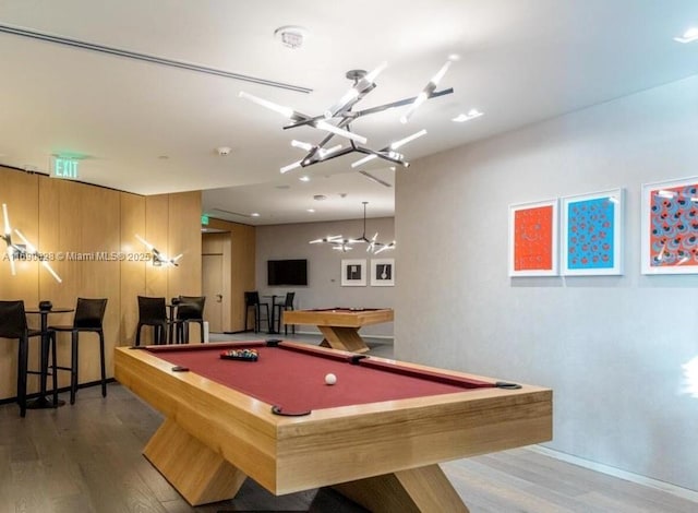playroom with wood finished floors, pool table, and baseboards