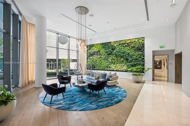 650 NE 32nd St Unit 602, Miami, FL 33137 - community lobby featuring a towering ceiling and expansive windows