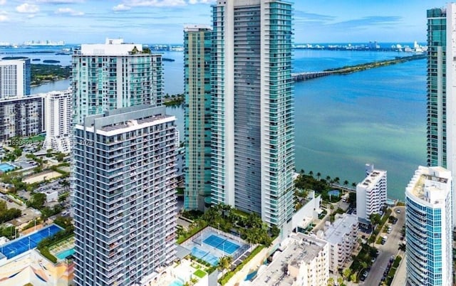 drone / aerial view with a water view and a view of city
