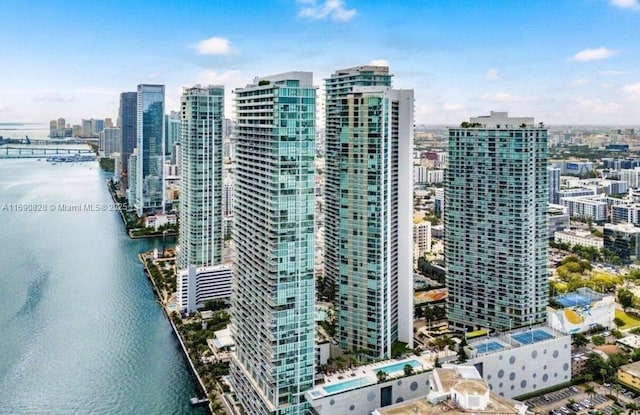exterior space with a water view