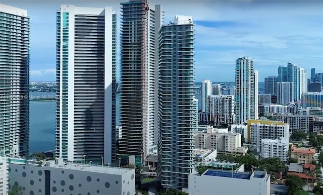 property's view of city featuring a water view