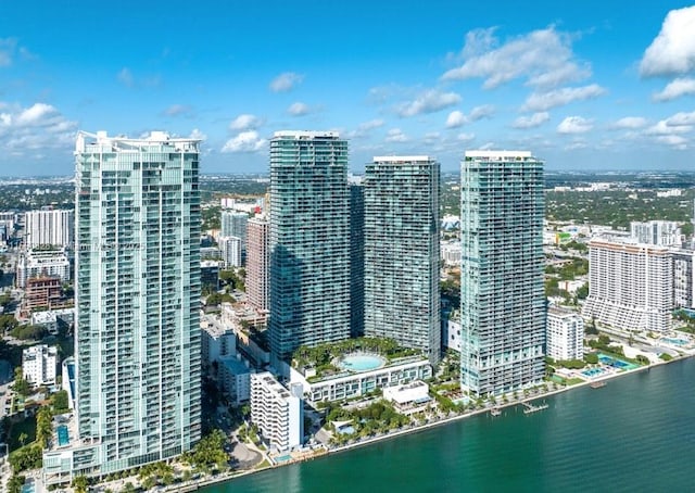 aerial view featuring a city view and a water view