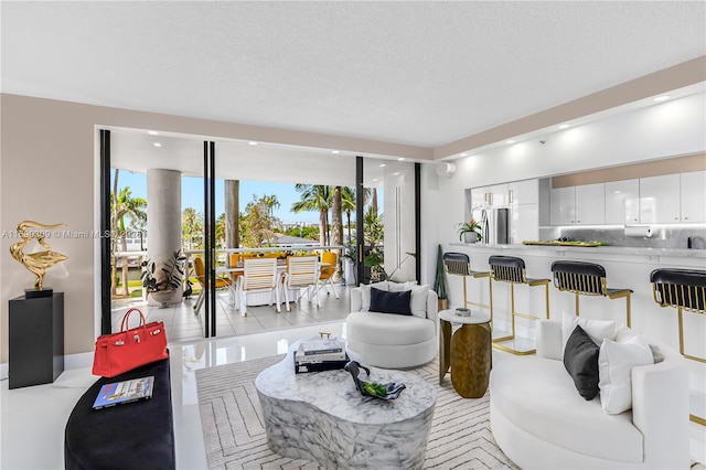 living room with a textured ceiling