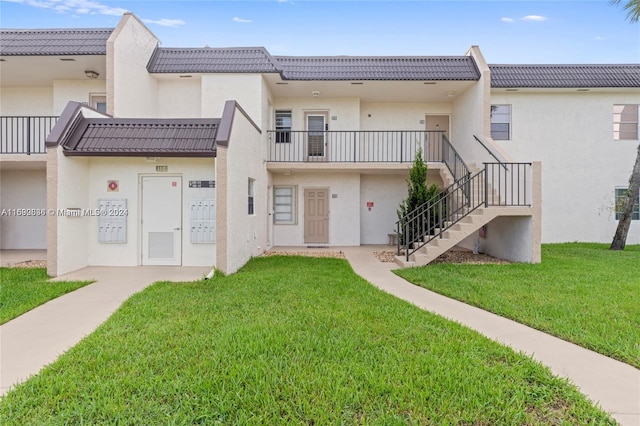 110 Lake Meryl Dr Unit 213, West Palm Beach, FL 33411 - view of property featuring stairs