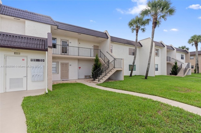 110 Lake Meryl Dr Unit 213, West Palm Beach, FL 33411 - view of property with stairway