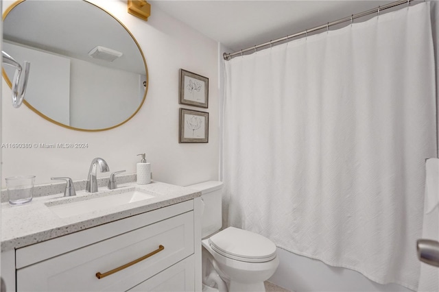 full bathroom with vanity, toilet, and shower / bath combination with curtain