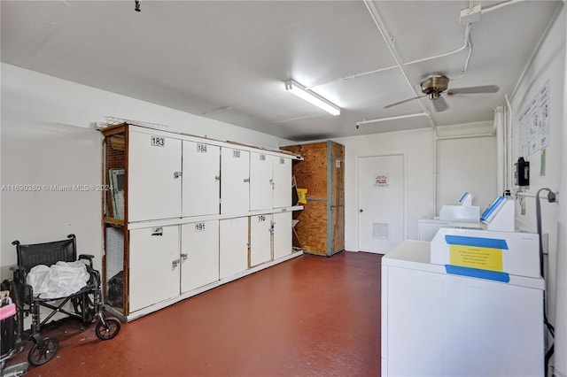 interior space featuring separate washer and dryer and ceiling fan