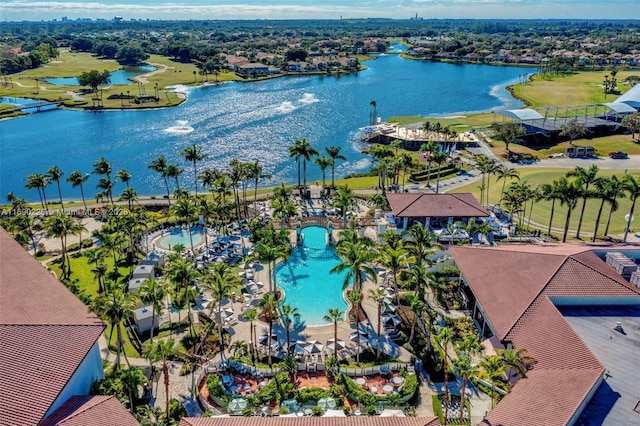 birds eye view of property with a water view