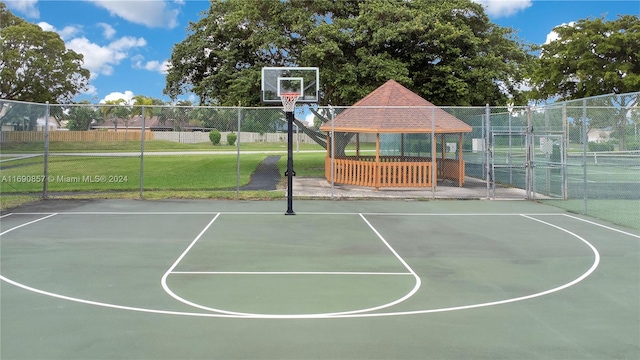 view of sport court with a gazebo