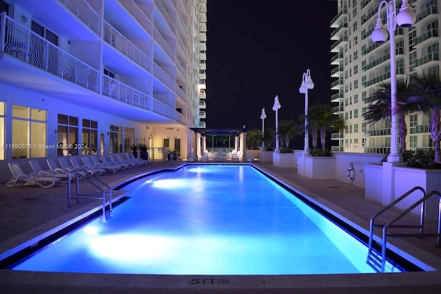 view of swimming pool with a patio