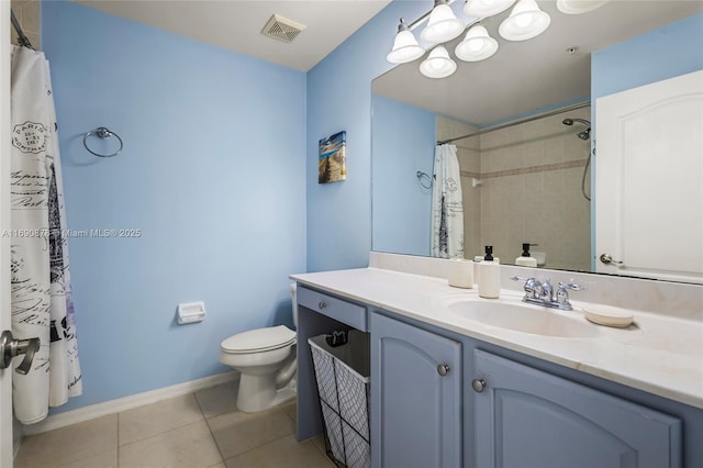 bathroom featuring toilet, vanity, tile patterned flooring, and curtained shower