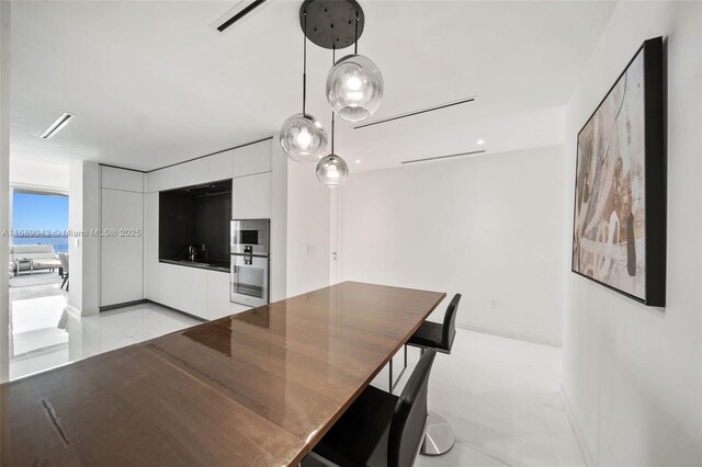 living room featuring plenty of natural light and a water view