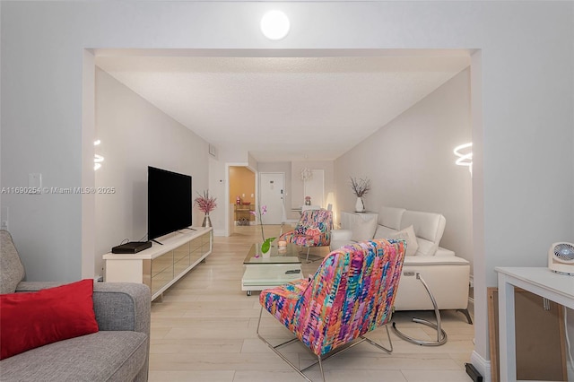 living area with light wood-style floors