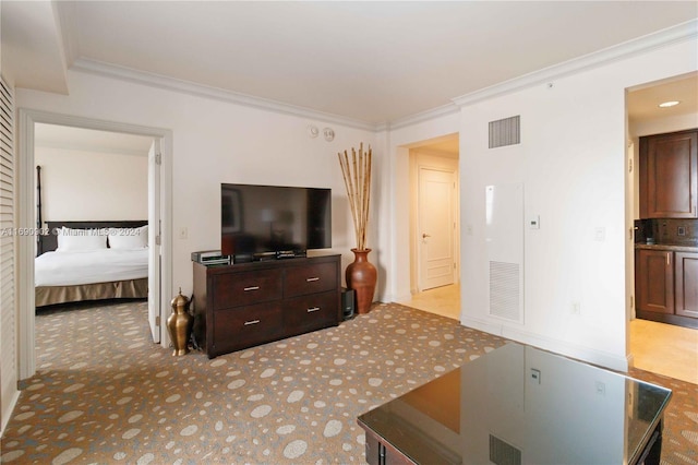 living room featuring crown molding