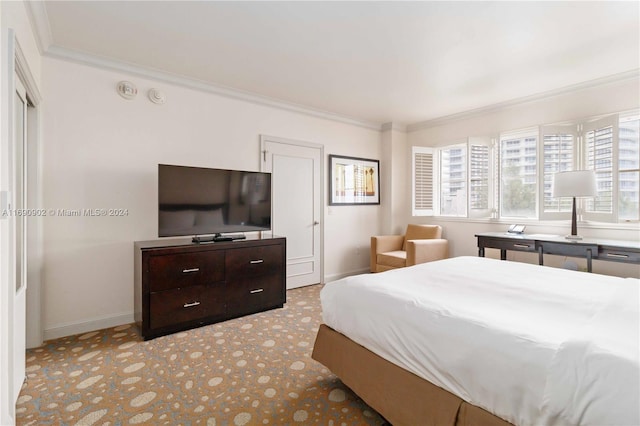 bedroom with ornamental molding