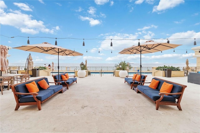 view of patio / terrace with a water view