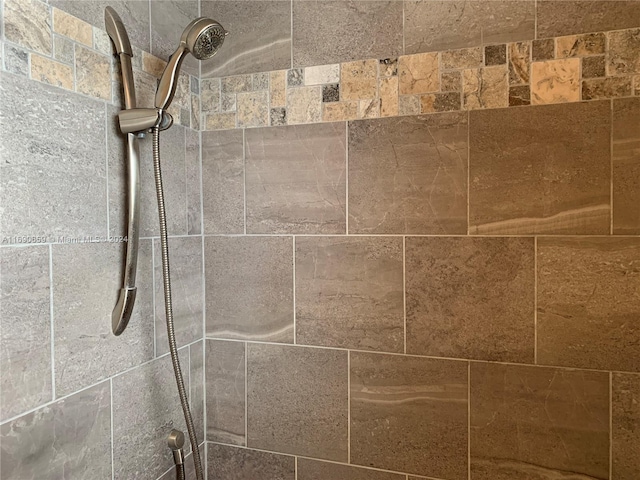 details with a tile shower