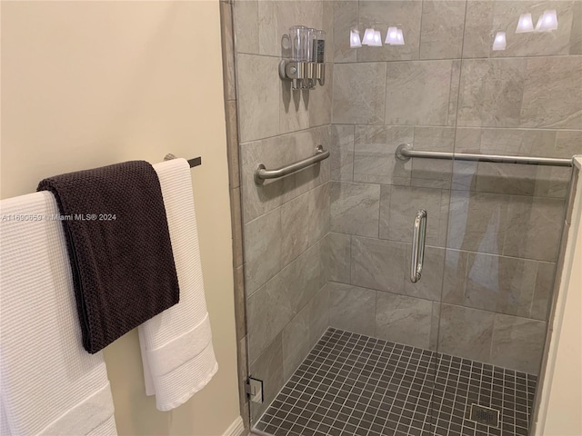 bathroom featuring an enclosed shower