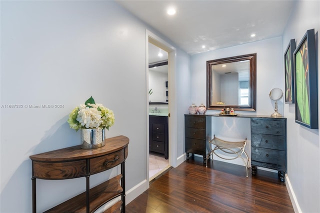 bathroom featuring hardwood / wood-style floors and vanity