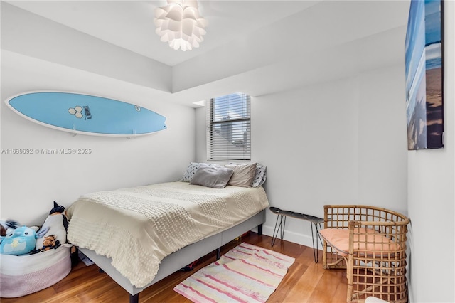 bedroom featuring hardwood / wood-style flooring