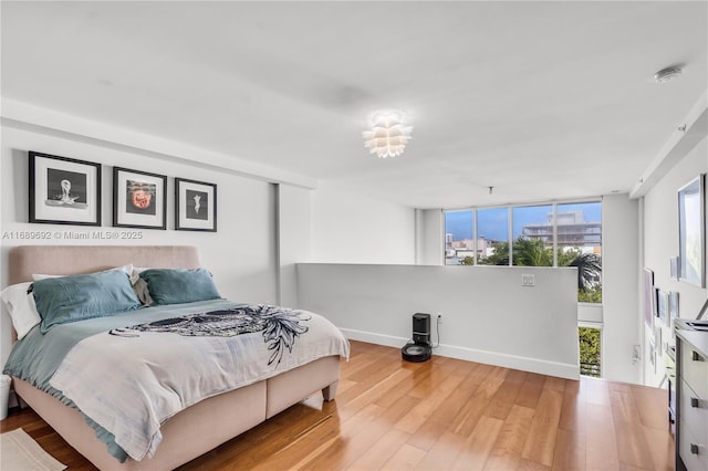 bedroom featuring hardwood / wood-style floors