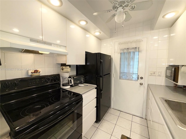 kitchen featuring black appliances, tasteful backsplash, sink, white cabinets, and ceiling fan