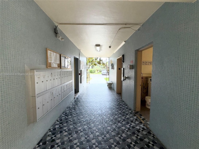 hall featuring mail boxes