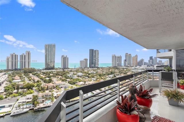 balcony featuring a water view