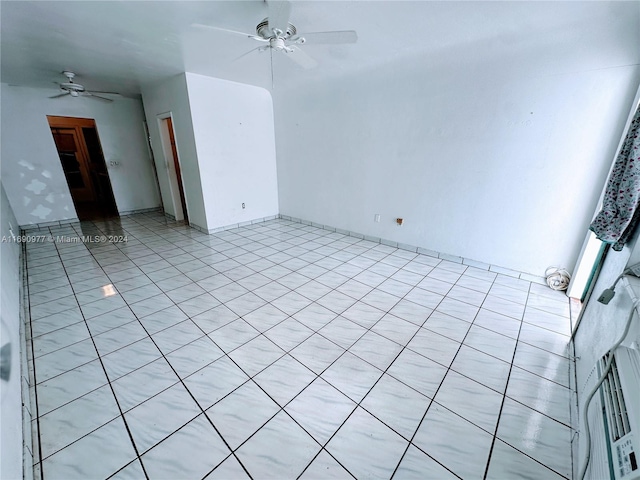 641 Espanola Way Unit 6, Miami Beach, FL 33139 - spare room featuring a ceiling fan and light tile patterned floors