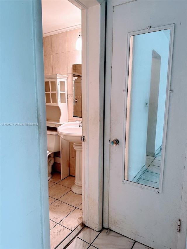 bathroom featuring tile walls and tile patterned floors