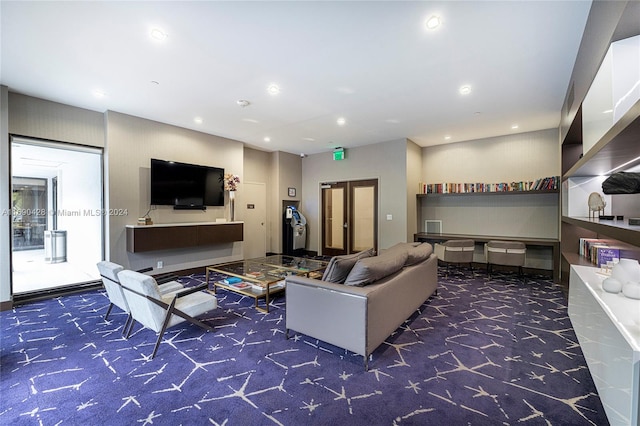 living room featuring dark colored carpet