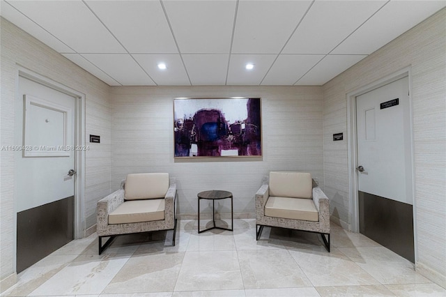 living area with light tile patterned floors