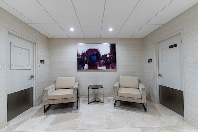 20225 NE 34th Ct Unit 1711, Aventura, FL 33180 - sitting room with recessed lighting and tile walls
