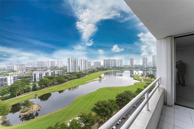 balcony featuring a water view