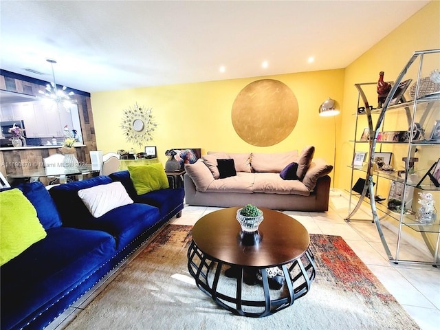 tiled living room featuring a notable chandelier