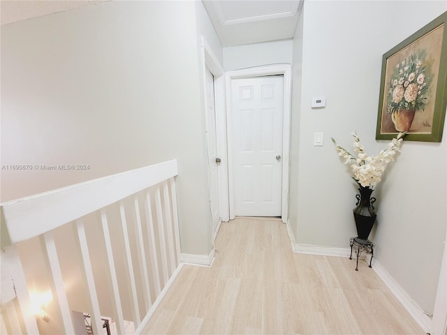 hall with light wood-type flooring