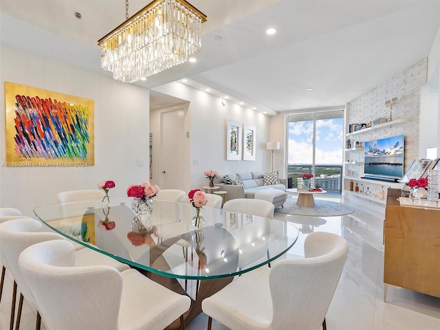 dining space featuring expansive windows, light tile patterned flooring, and an inviting chandelier