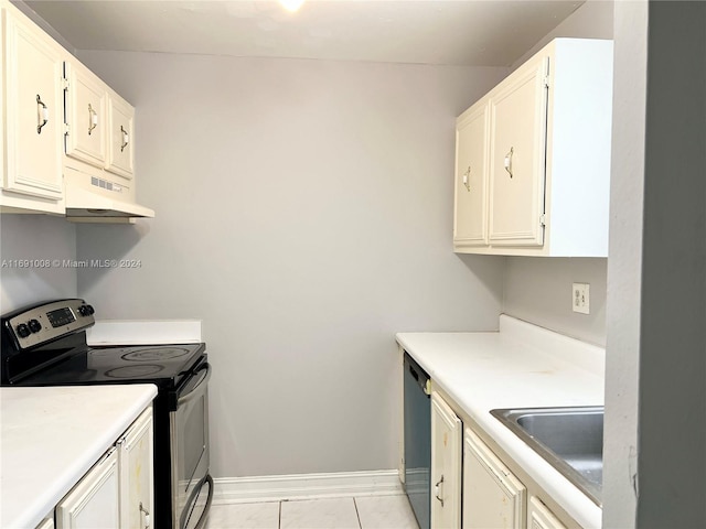 kitchen with white cabinetry, appliances with stainless steel finishes, light tile patterned flooring, and sink