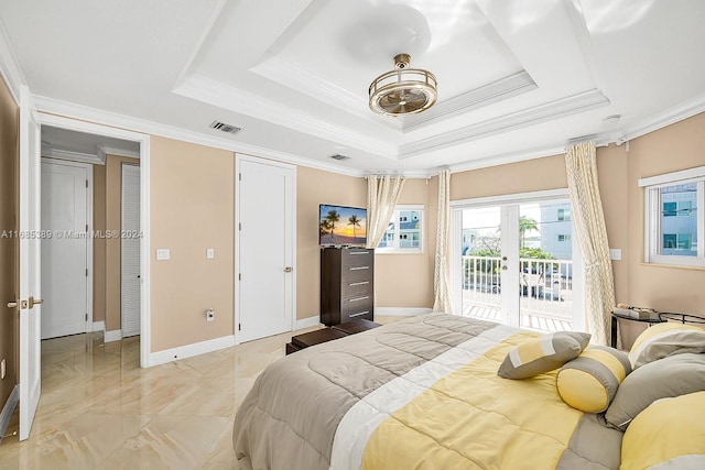 bedroom featuring crown molding, a raised ceiling, french doors, and access to outside