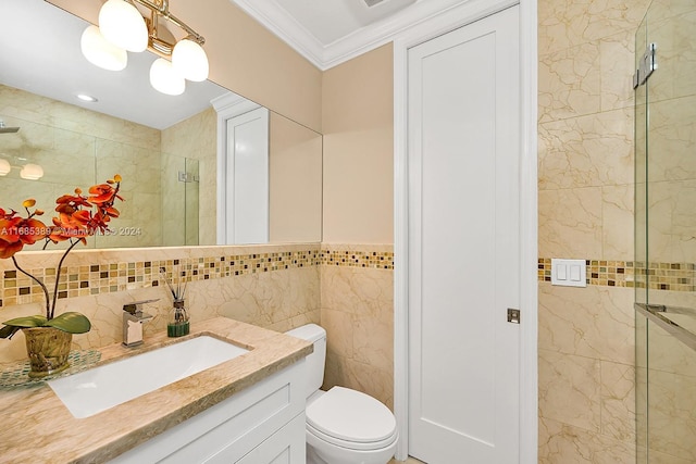 bathroom with toilet, a shower with door, tile walls, ornamental molding, and vanity