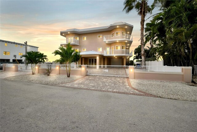 balcony at dusk with a water view