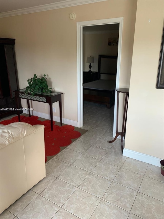 corridor featuring light tile patterned floors and crown molding