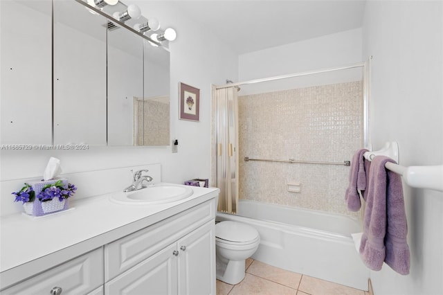 full bathroom featuring tile patterned floors, vanity, toilet, and shower / tub combo with curtain