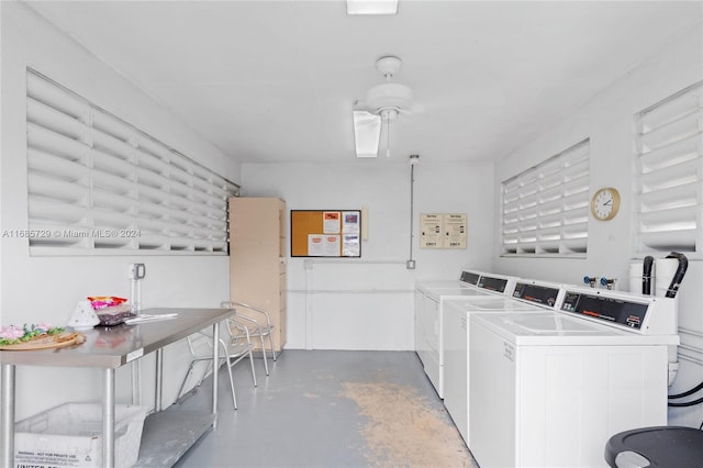 clothes washing area with washer and clothes dryer