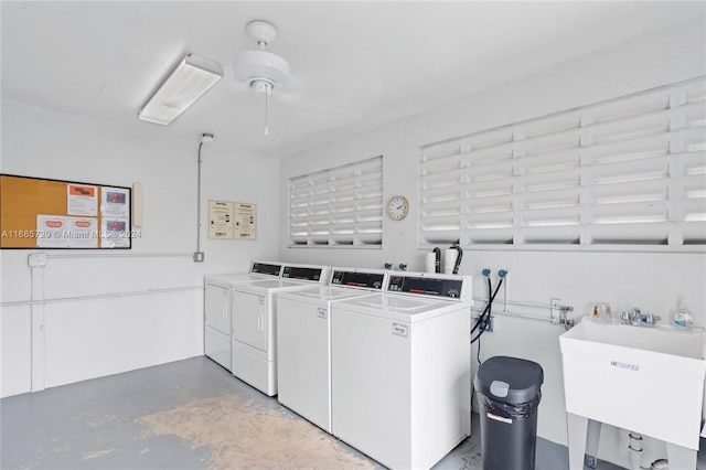 washroom featuring sink and independent washer and dryer