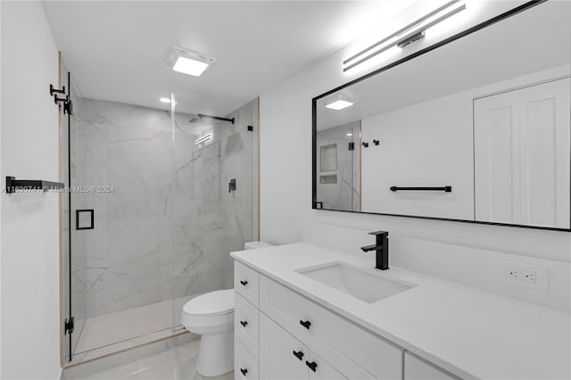 bathroom with walk in shower, toilet, vanity, and tile patterned floors