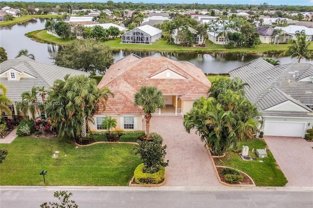 174 NW Magnolia Lakes Blvd, Port St Lucie, FL 34986 - aerial view of residential area with a large body of water
